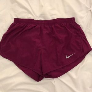 Burgundy nike running shorts